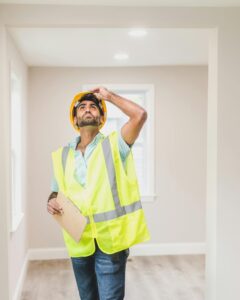 Inspector inspecting ceiling